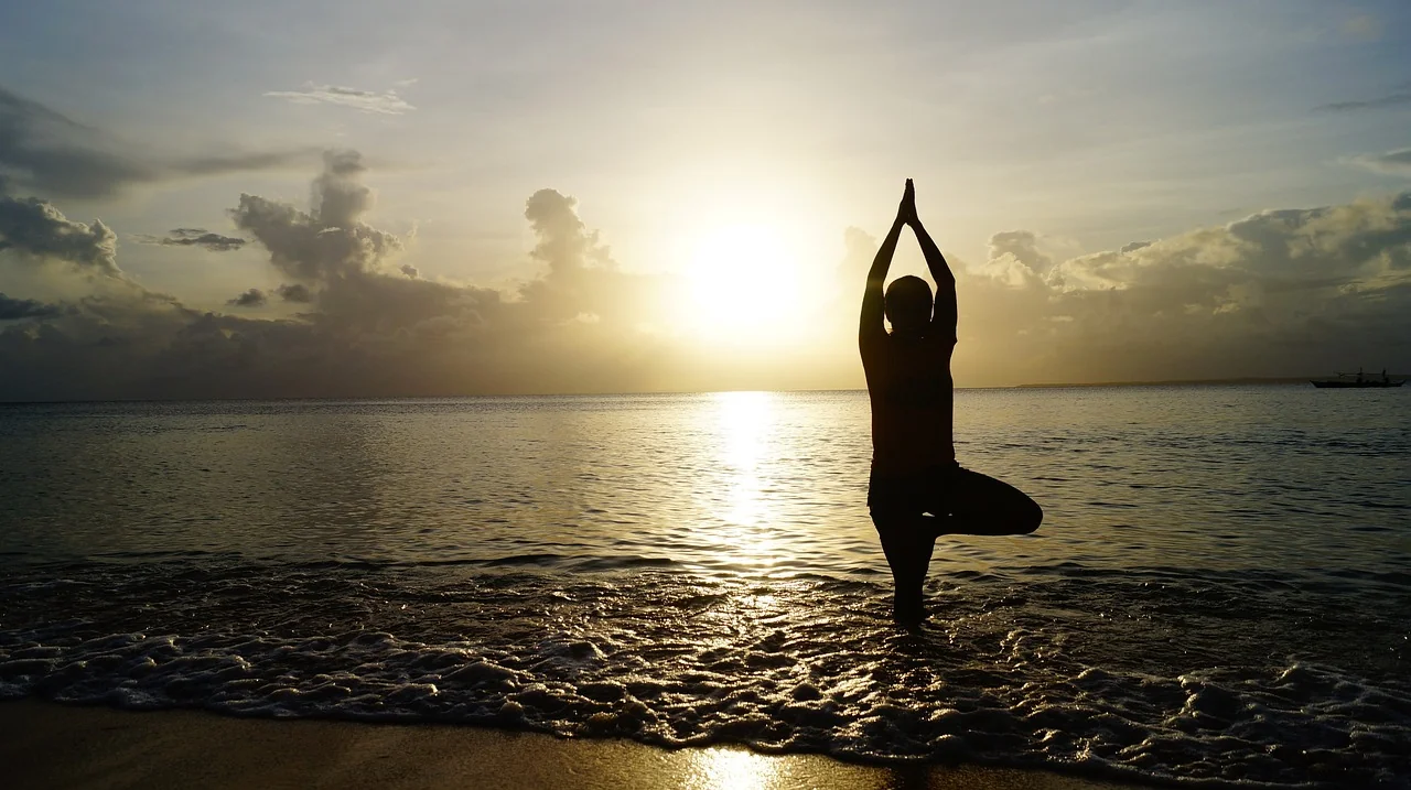 Yoga poses for 4 person - stock photo